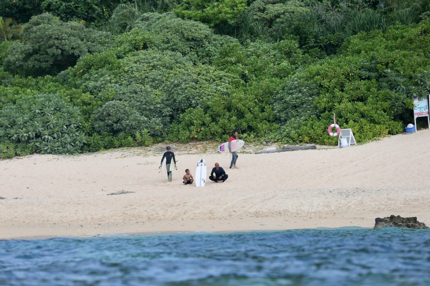 Surfers.