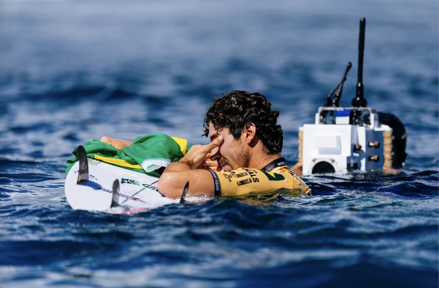 Pictured: Brazil's Yago Dora takes in the emotion of his achievement after winning his maiden World Title at the Lexus WSL Finals Fiji Presented by Corona Cero. Credit: WSL / Ed Sloane